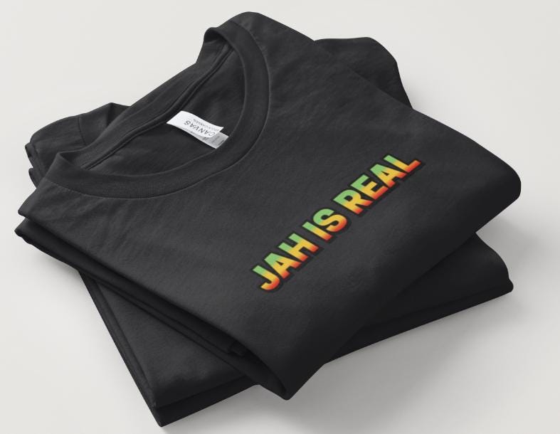 Reggae-Inspired Song Lyrics Design. "JAH IS REAL". Black Short Sleeve