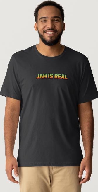 Reggae-Inspired Song Lyrics Design. "JAH IS REAL". Black Short Sleeve